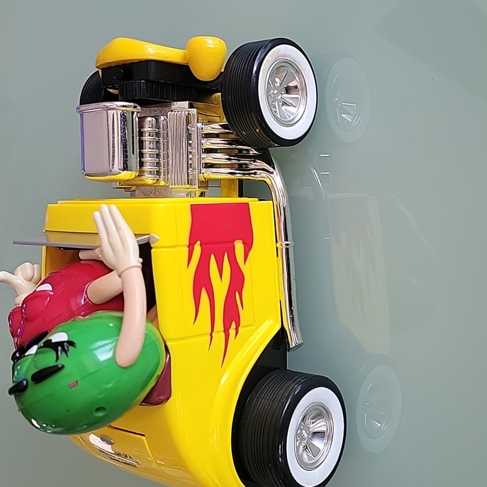 Vintage M&M's."Rebel Without A Clue" Yellow Hot Rod Car Candy Dispenser.